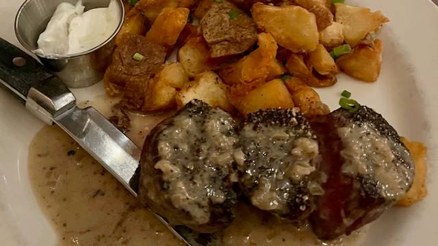Elevation Bistro signature dishes The menu changes seasonally but includes items like Pan-Seared Scallops, Filet Mignon, and specialty pasta dishes.